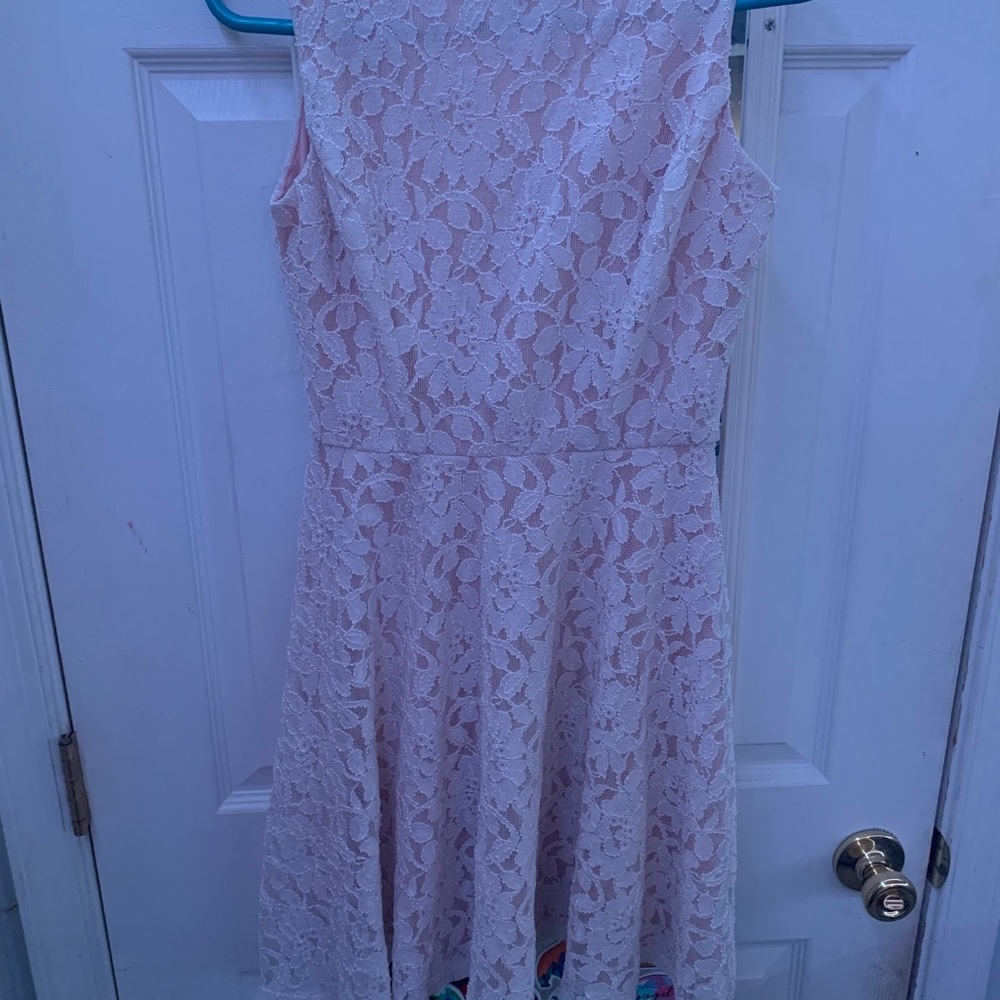 Pink dress with white lace detail